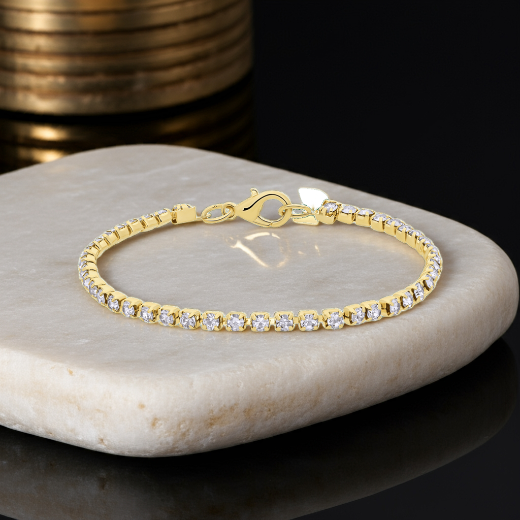 Bijoux goudkleurige tennisarmband met witte stras