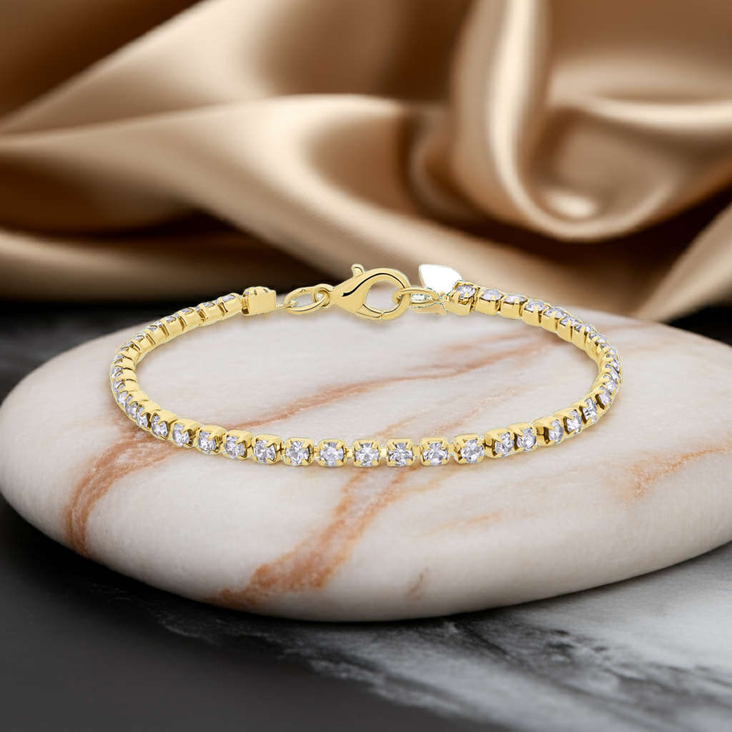 Bijoux goudkleurige tennisarmband met witte stras