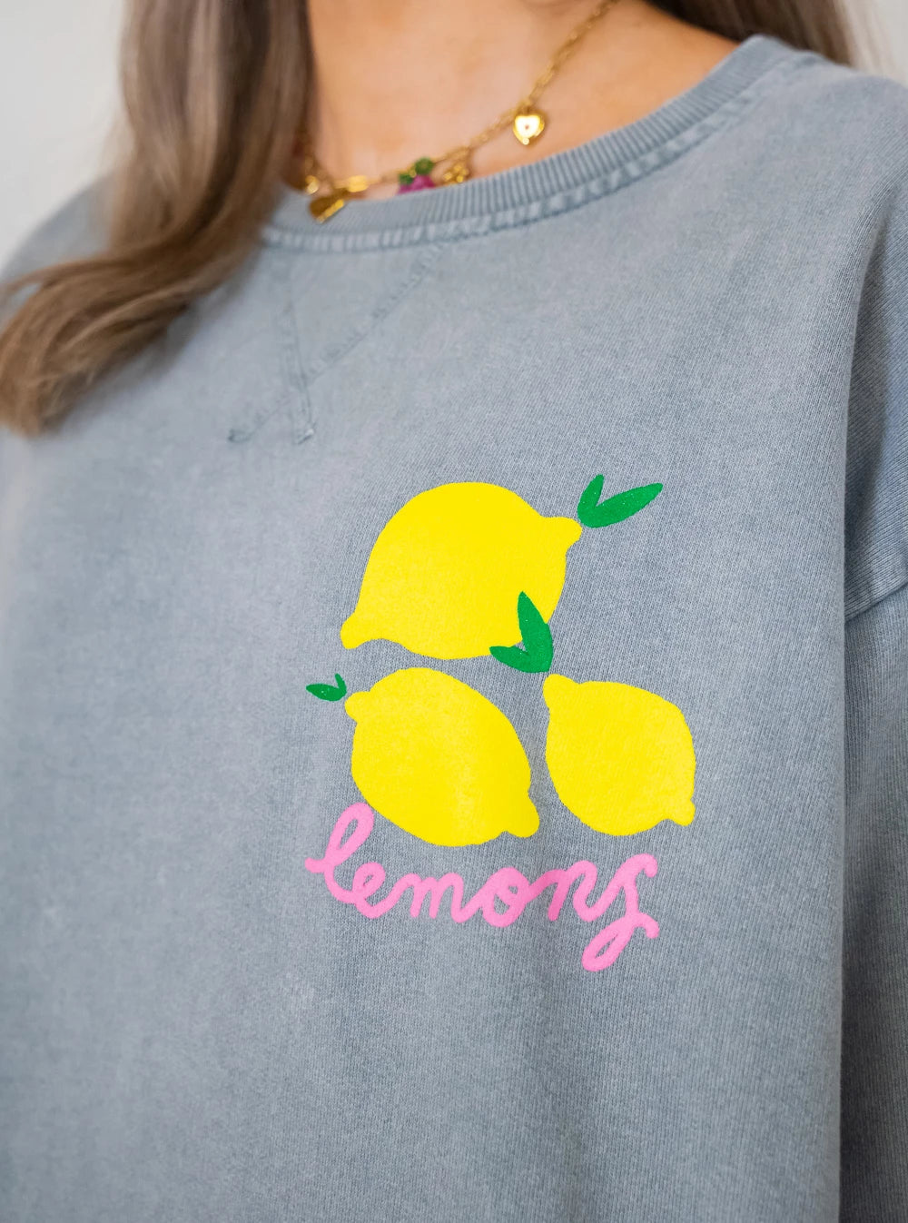 sweater citroen grijs